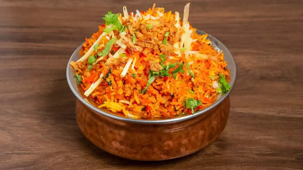 Aromatic basmati rice and marinated chicken for Chicken Biryani